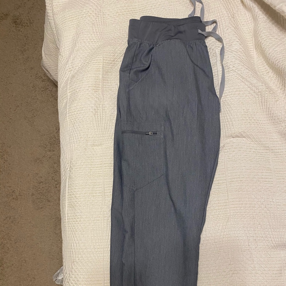 Yola figs scrub pants.